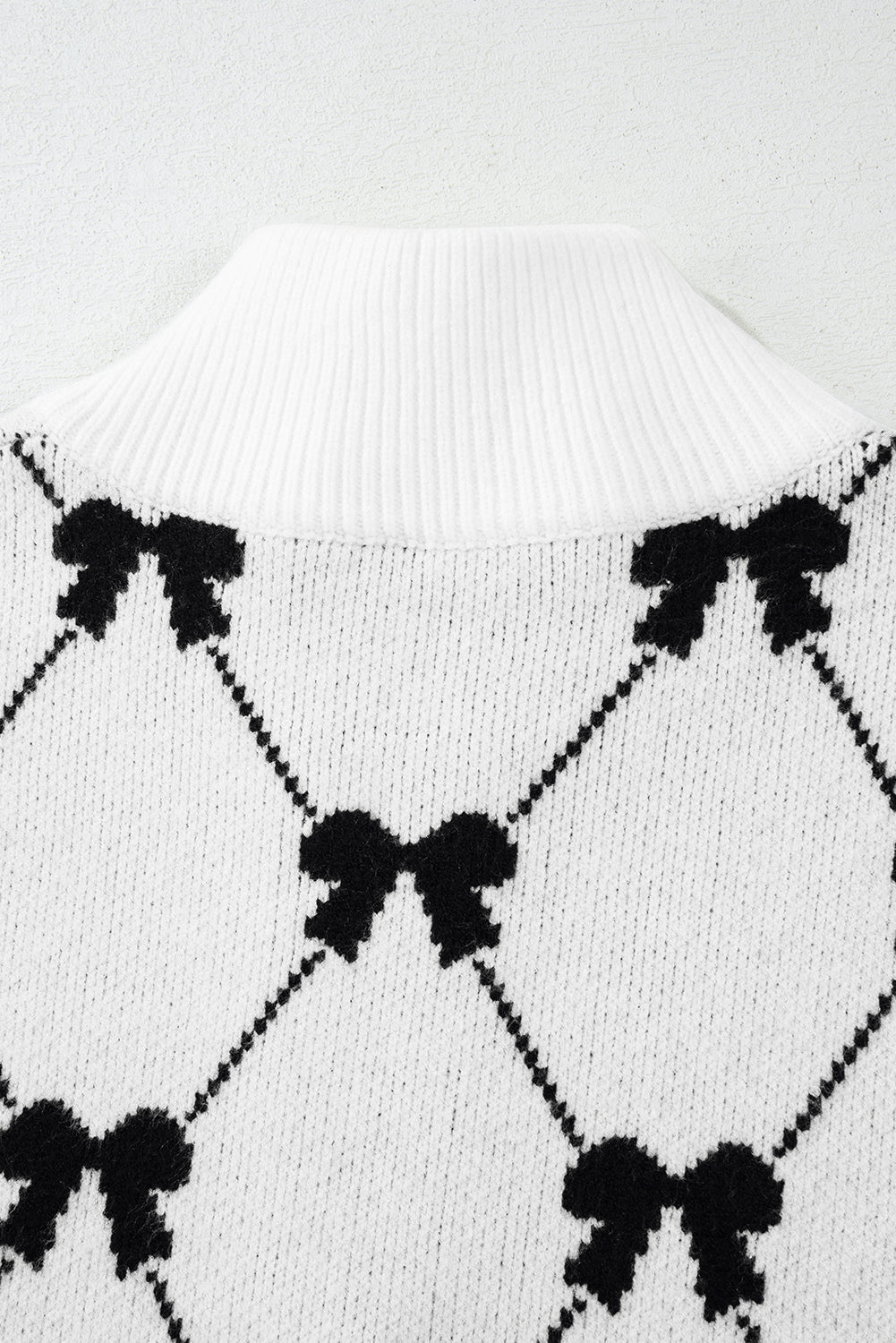 Black Bow Print Zipped Collar Sweater